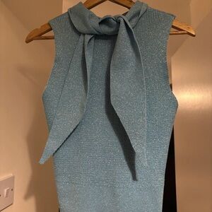 Chic Sleeveless Blue Top with Bow Accent